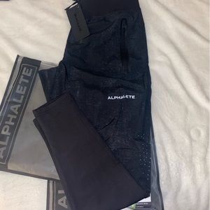 Mens black infinity tech Alphalete size M NEW